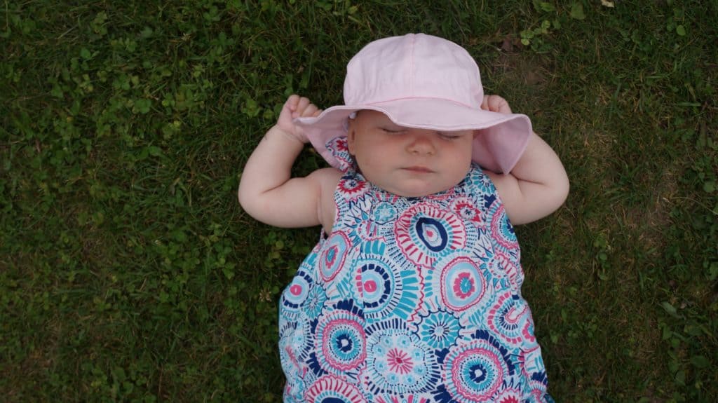Twinklebelle Gro-with-me sunhat on a baby