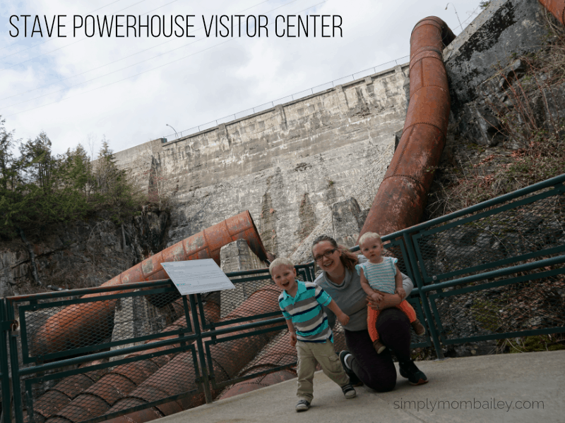Mom and Kids outside Stave Powerhouse Visitor Center witht the water tubes