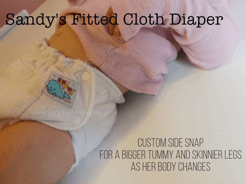 Snap location on the side snaps of the sandy's fitted cloth dipaer on a toddler