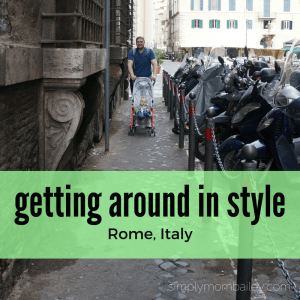 dad pushing maclaren stroller in rome, italy