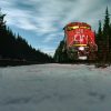 CN Rail Train at Night along snow.